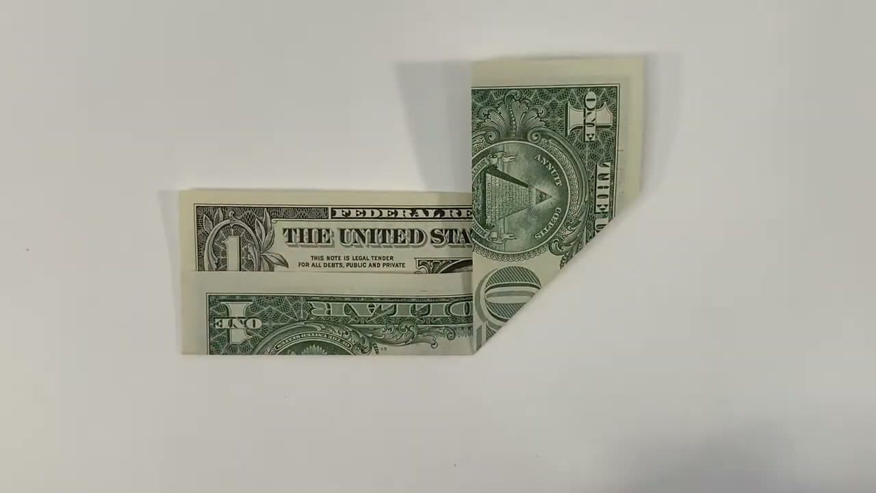 Step 4: Fold Both Bottom Edges In to the Center Crease - How to Fold Money Into a Heart