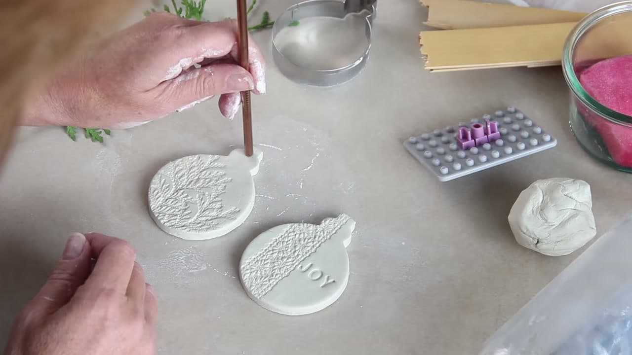 Step 7: Punch the Hanging Hole With a Metal Straw - How to Make Air Dry Clay Ornaments for Christmas