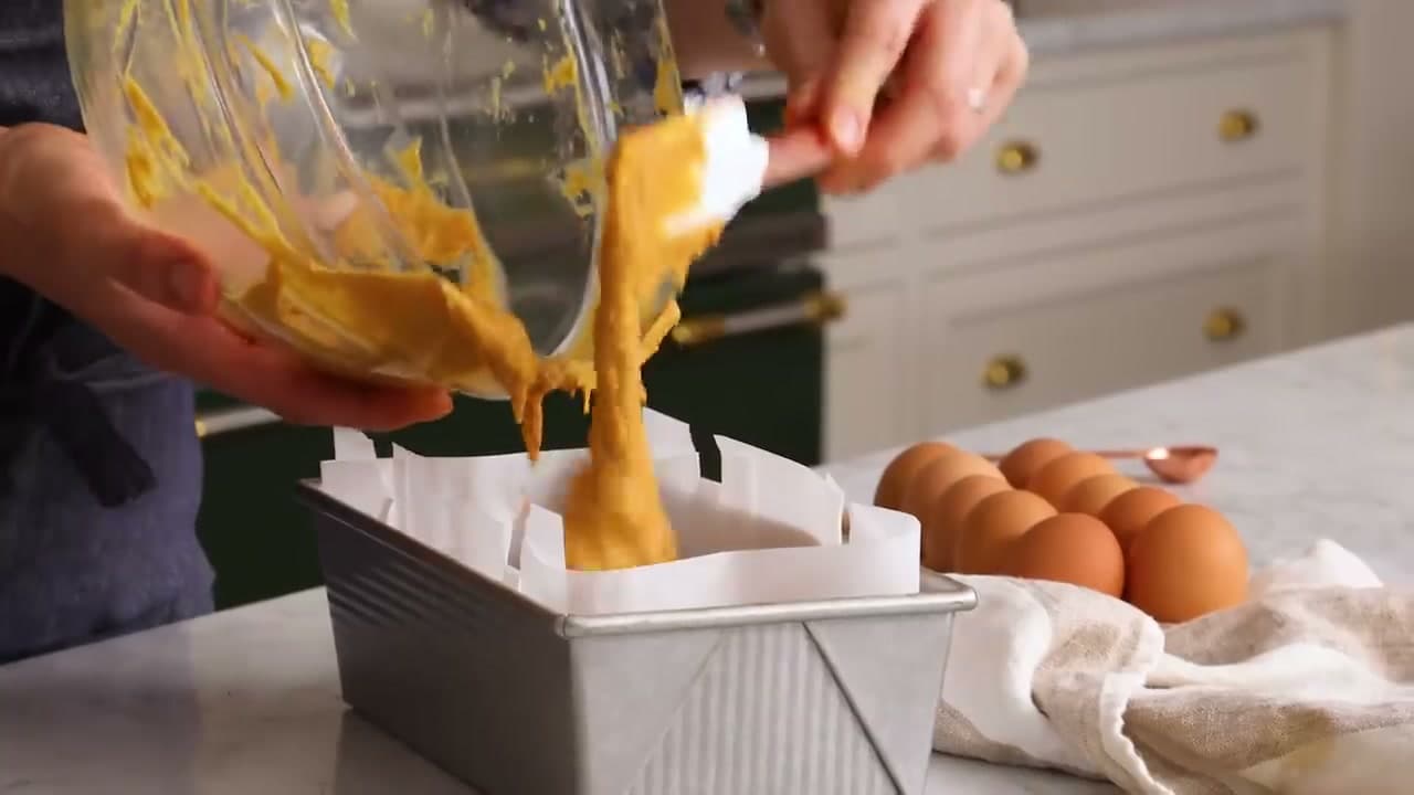 Step 7: Scrape Into a Parchment-Lined Loaf Pan