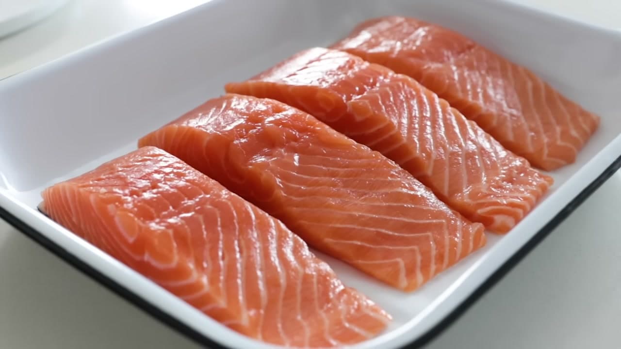 Step 2: Arrange the Fillets in a Baking Dish - How to Bake Salmon in the Oven (Lemon Garlic Butter)
