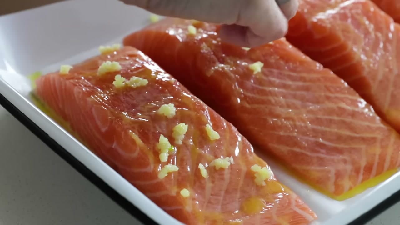 Step 5: Add the Garlic, Salt and Pepper - How to Bake Salmon in the Oven (Lemon Garlic Butter)