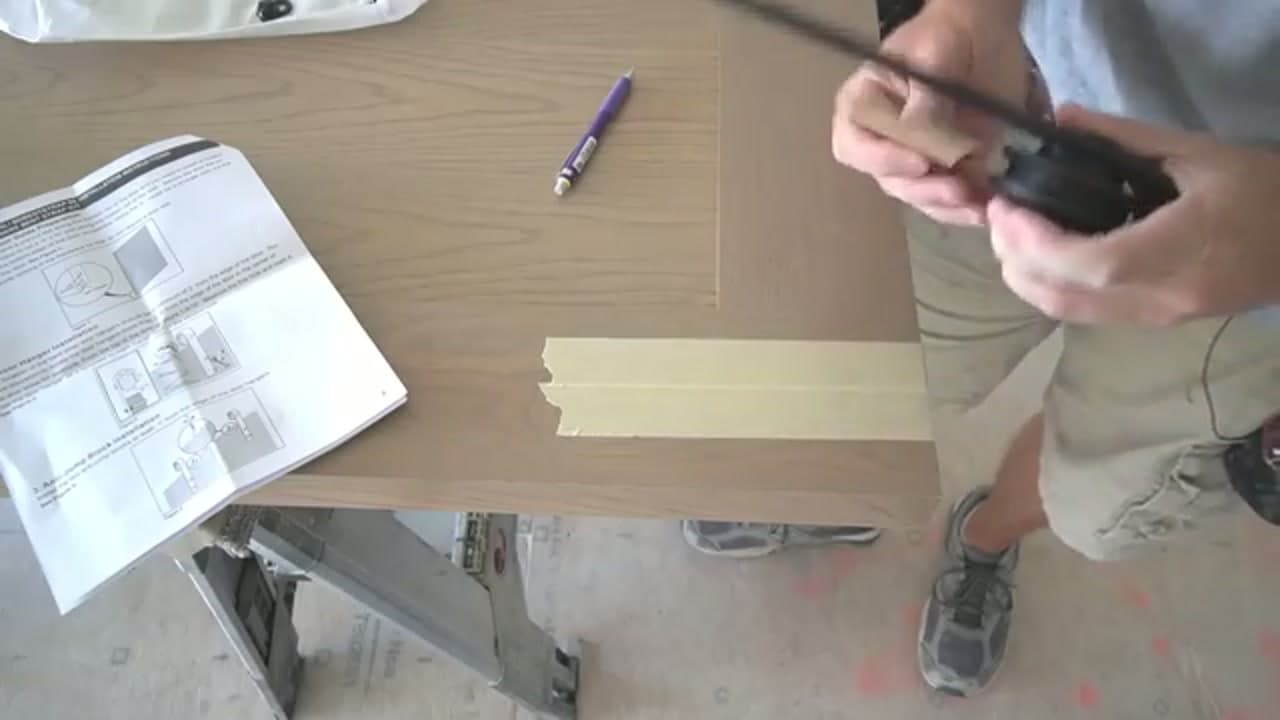 Step 1: Step 1: Mark the Roller Hanger Holes on the Door