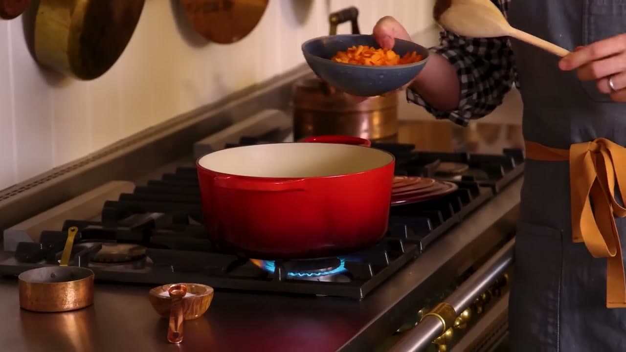Step 2: Step 2: Sweat the Onions and Carrots in Butter