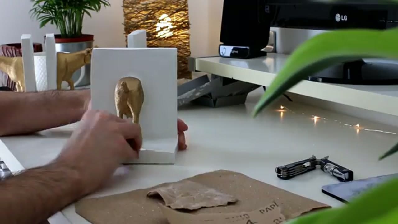 The finished result: How to Make Concrete Bookends with Gold Animals