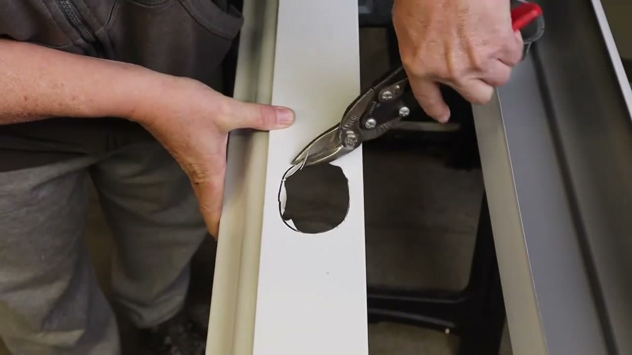 Step 4: Step 4: Cut the Downspout Hole with Aviation Snips