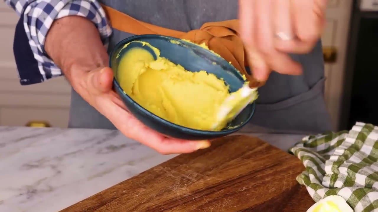 Step 5: Step 5: Mash yolks with mayo, dijon, vinegar, and seasoning