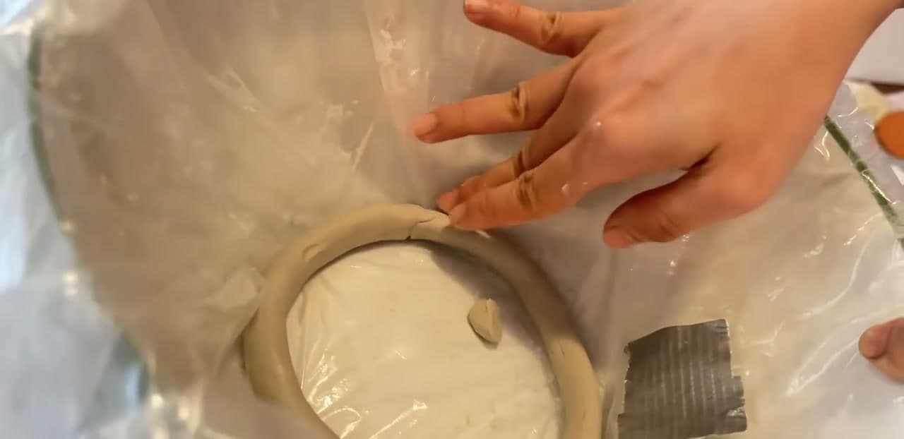 Step 4: Spiral the First Coil Into the Base - How to Make a Coil Pot