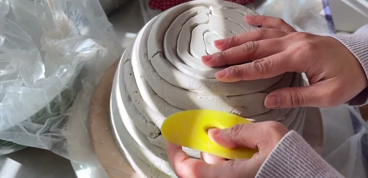 Step 9: Rib the Outside Smooth - How to Make a Coil Pot