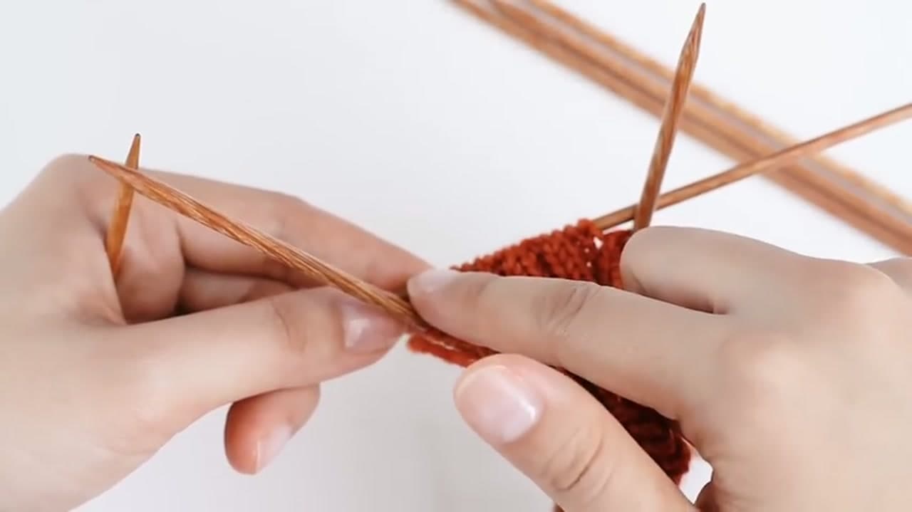 Step 3: Step 3: Work the Setup Round with Larger Needles