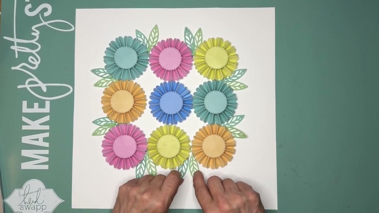 Step 6: Tuck Leaves Into the Gaps - How to Make a Paper Rosette Scrapbook Layout