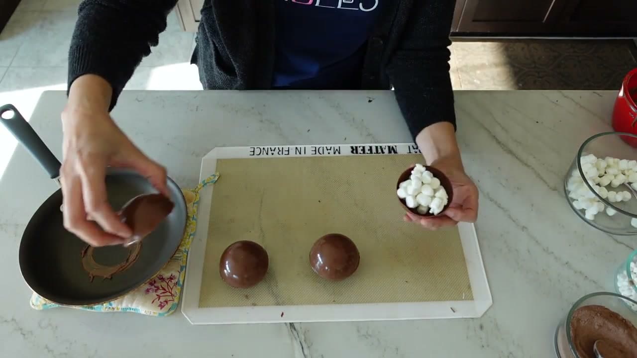Step 7: Weld the Two Halves Together on a Warm Pan - Hot Cocoa Bomb Recipe: How to Make Them at Home