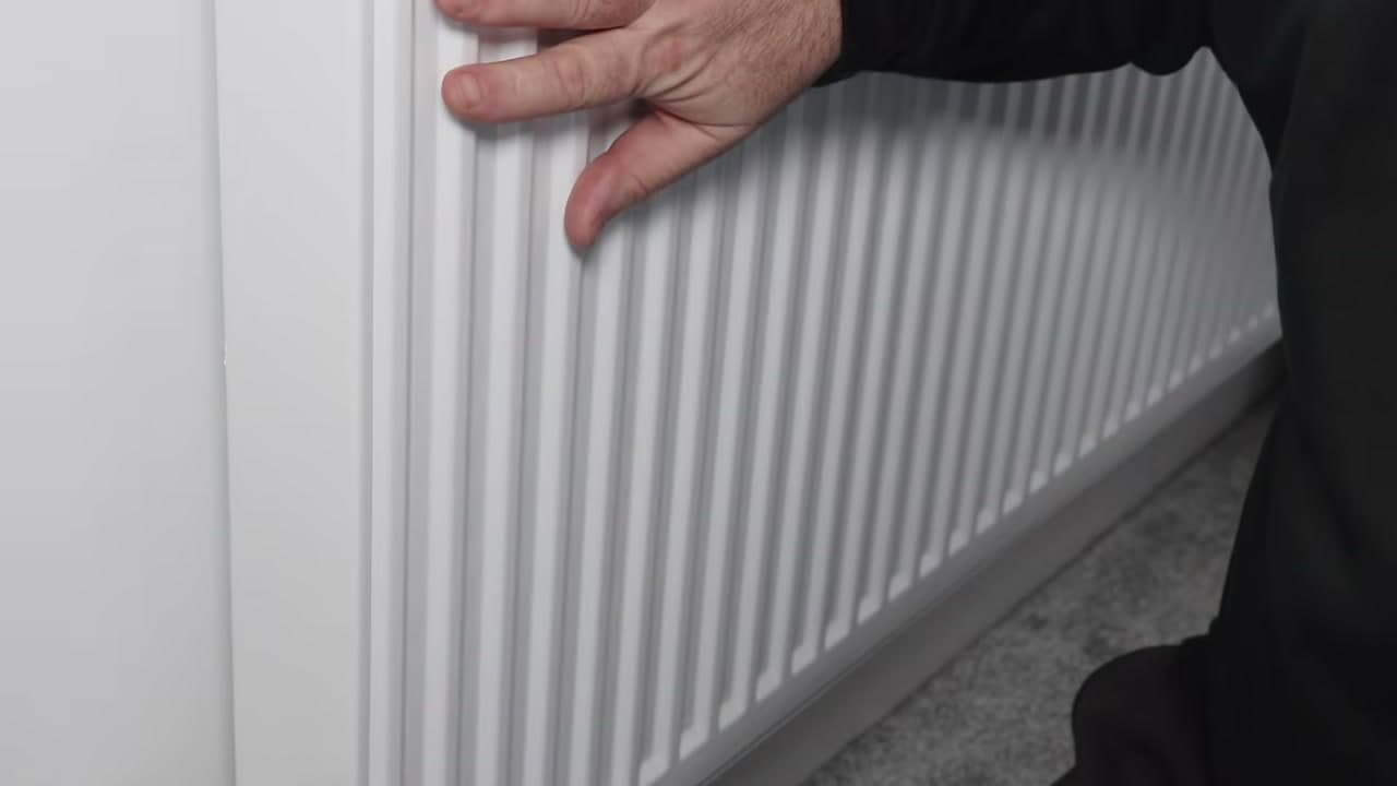 Step 1: Feel the Radiator Panel from Top to Bottom - How to Bleed a Radiator and Get the Pressure Back Up