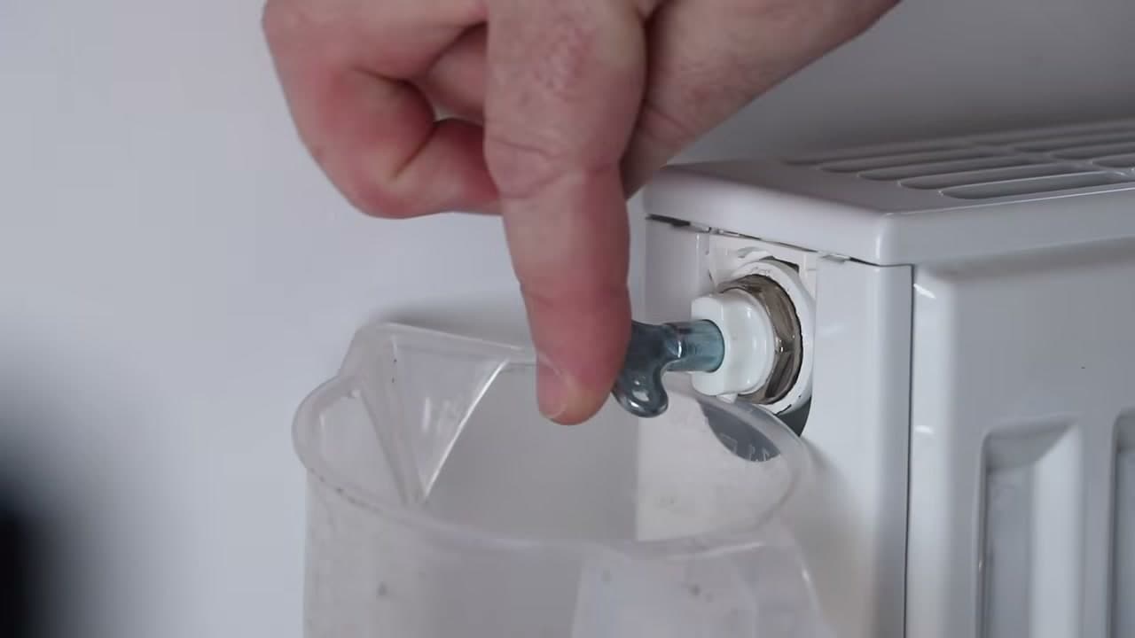 Step 4: Fit the Bleed Key and Turn It Counterclockwise - How to Bleed a Radiator and Get the Pressure Back Up