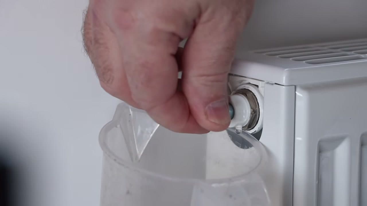 Step 5: Close the Bleed Valve When Water Runs Out - How to Bleed a Radiator and Get the Pressure Back Up