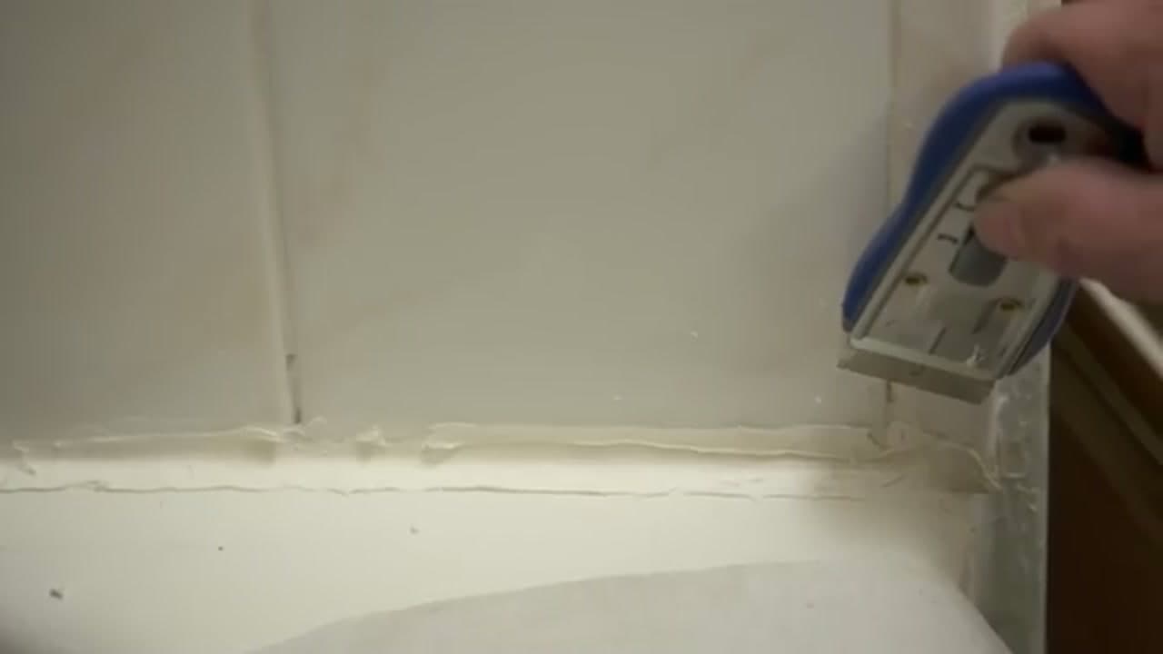 Step 3: Step 3: Slice the Caulk Off the Wall