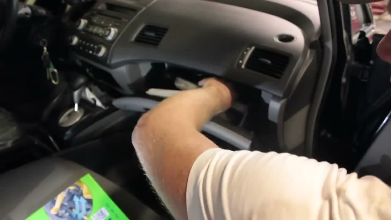 Step 2: Step 2: Empty the Glove Box and Drop It Down