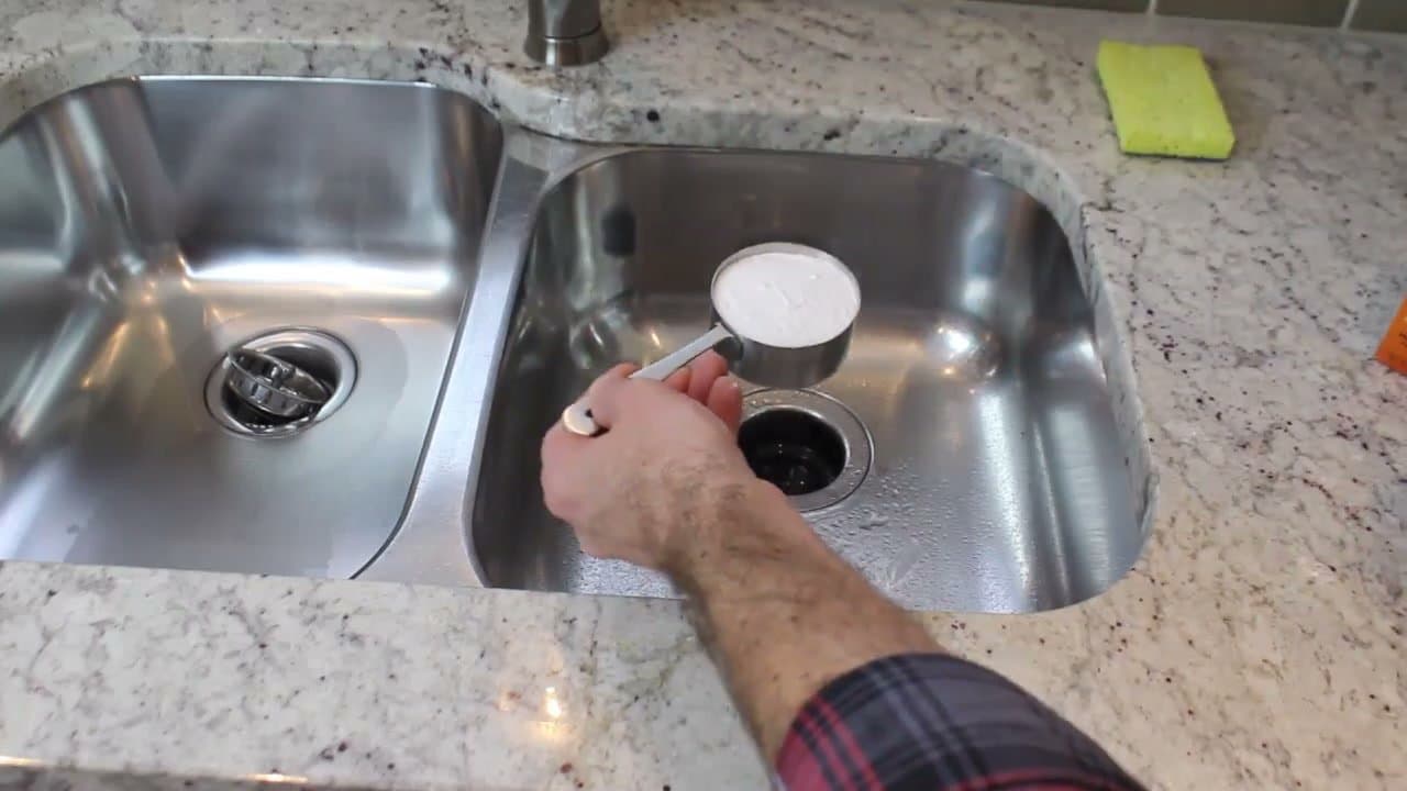 Step 4: Step 4: Pour half a cup of baking soda down the drain and let it sit