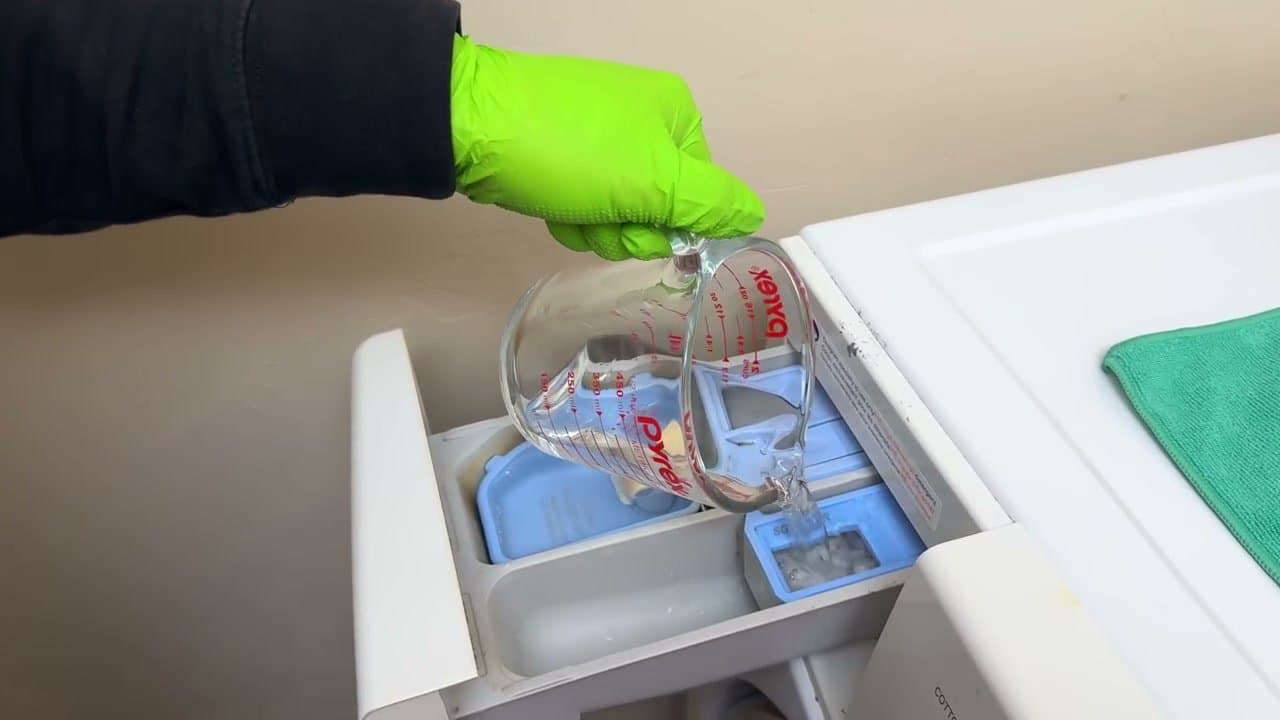 Step 2: Step 2: Run a clean cycle with vinegar or a tablet