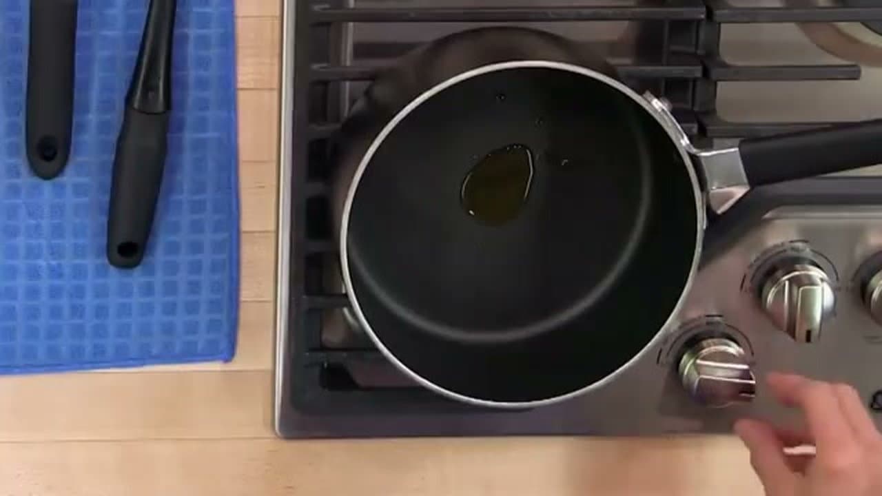 Step 3: Step 3: Heat olive oil in the pan