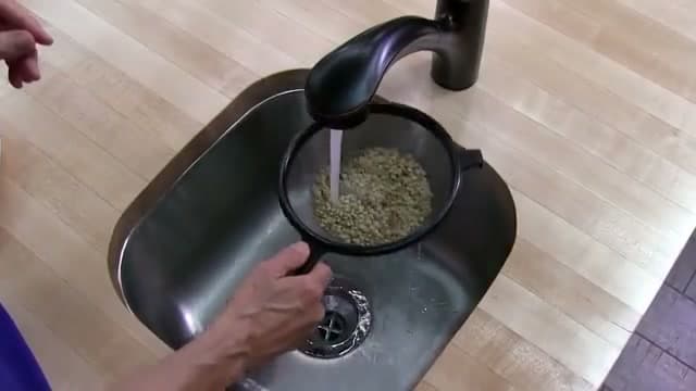 Step 2: Step 2: Examine and rinse the lentils