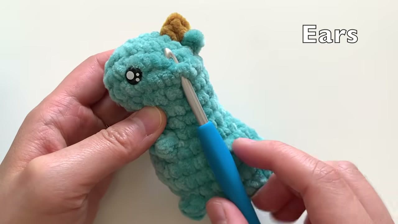 Step 2: Step 2: Attach the First Ear