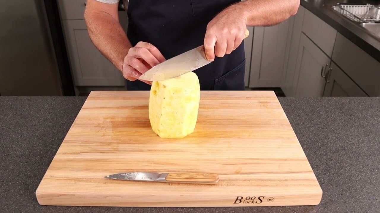 Step 4: Step 4: Cut in half through the core, then quarter