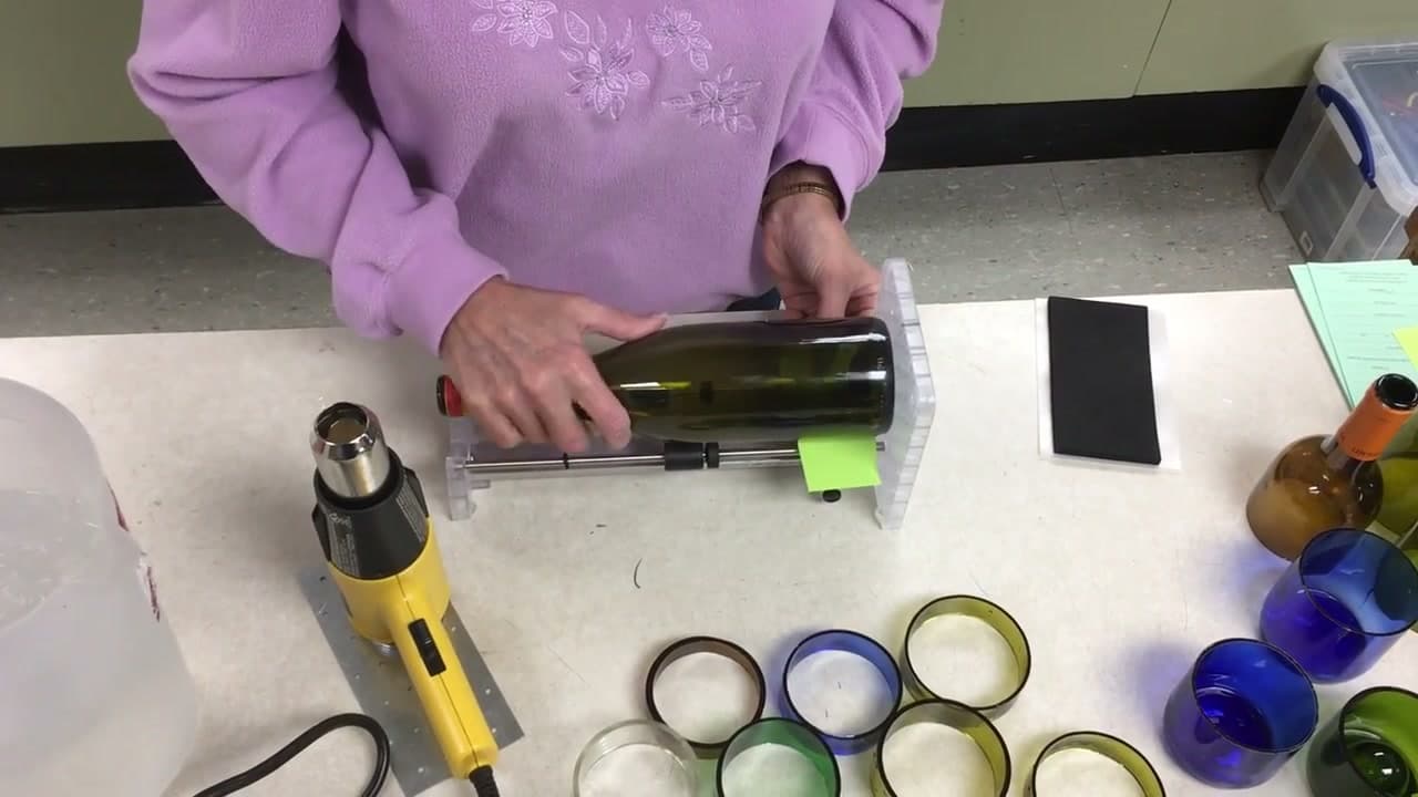 Step 3: Slip a Scrap of Paper Under the Cutting Wheel - How to Cut a Glass Bottle Into Rings