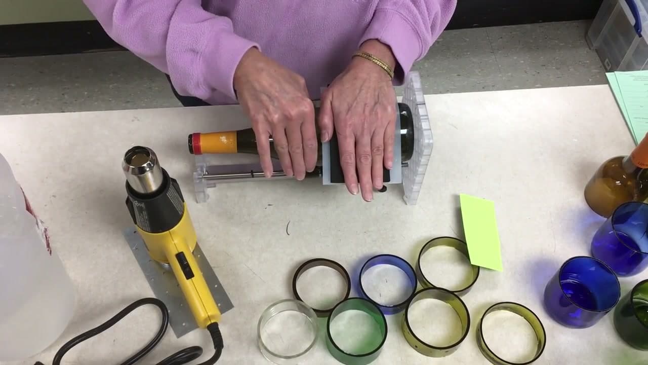 Step 5: Loosen the Head and Roll the Bottle Toward You - How to Cut a Glass Bottle Into Rings