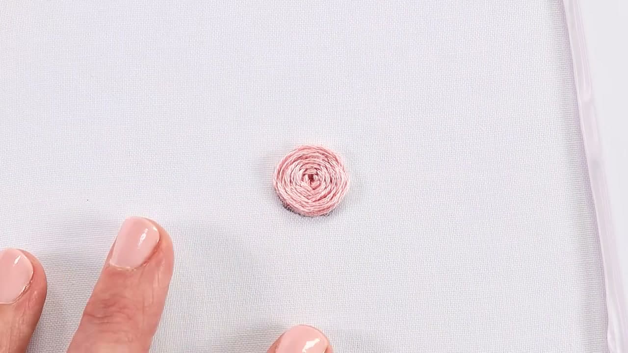 The finished result: How to Embroider a Rose (Easy Woven Wheel Stitch)