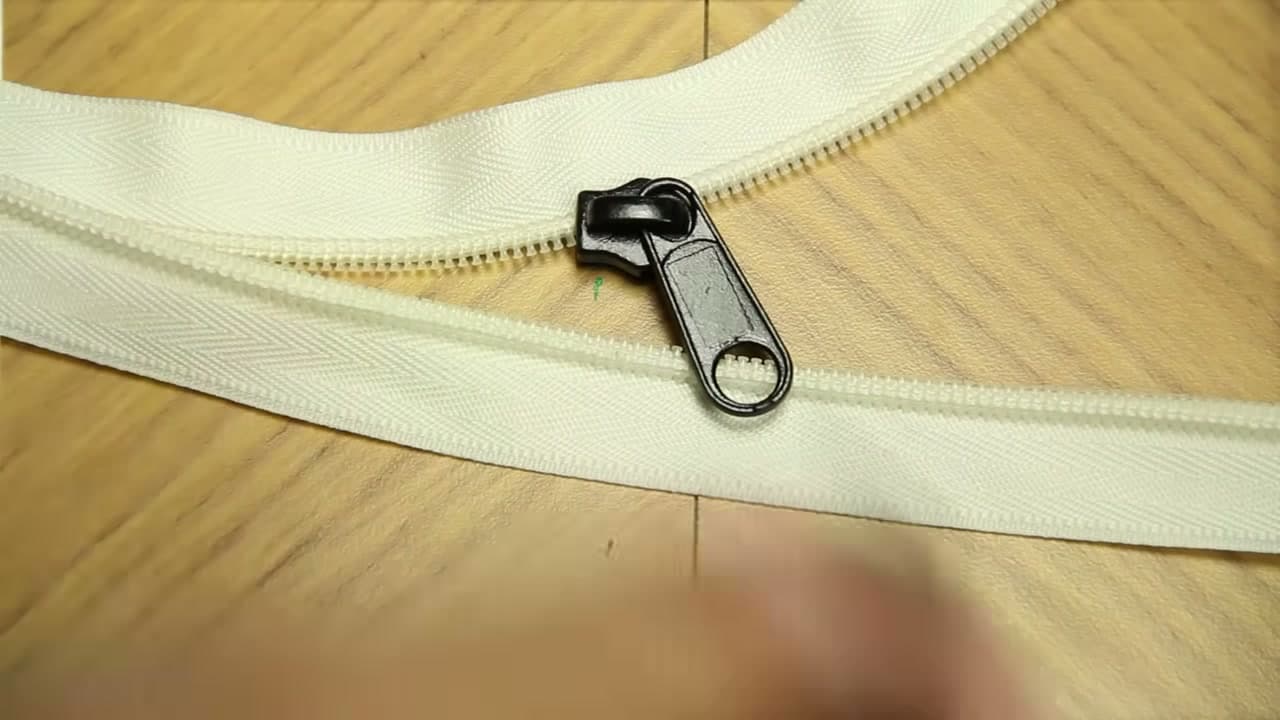 Step 1: Find Where the Chain Came Out - How to Fix a Zipper That Came Off the Track