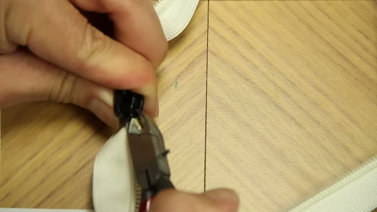 Step 4: Feed the First Side In - How to Fix a Zipper That Came Off the Track