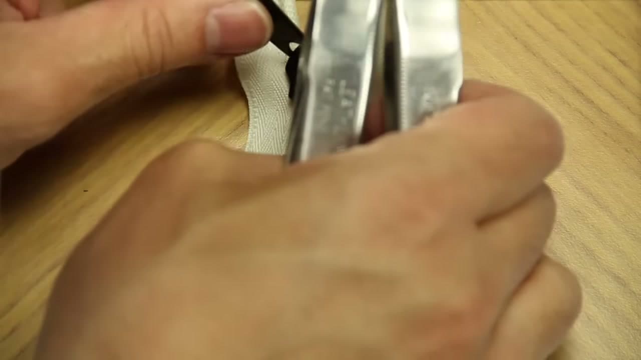 Step 7: Pinch the Slider Closed - How to Fix a Zipper That Came Off the Track