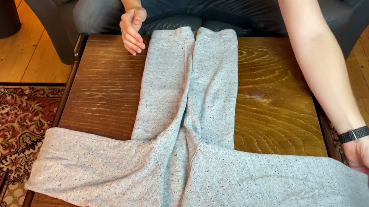 Step 2: Method 1: Fold the Sleeves Down and Bring the Body Into Thirds