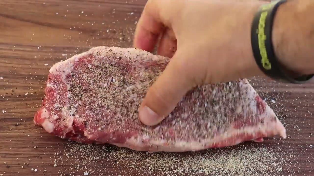 Step 2: Step 2: Season heavy with salt, pepper, and garlic powder