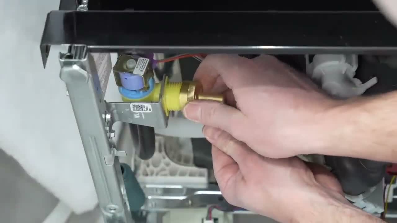 Step 4: Step 4: Lay the Dishwasher Down and Thread the Water Elbow