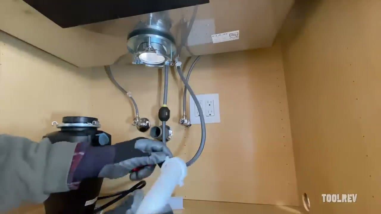 Step 5: Step 5: Attach the Discharge Tube to the Disposal