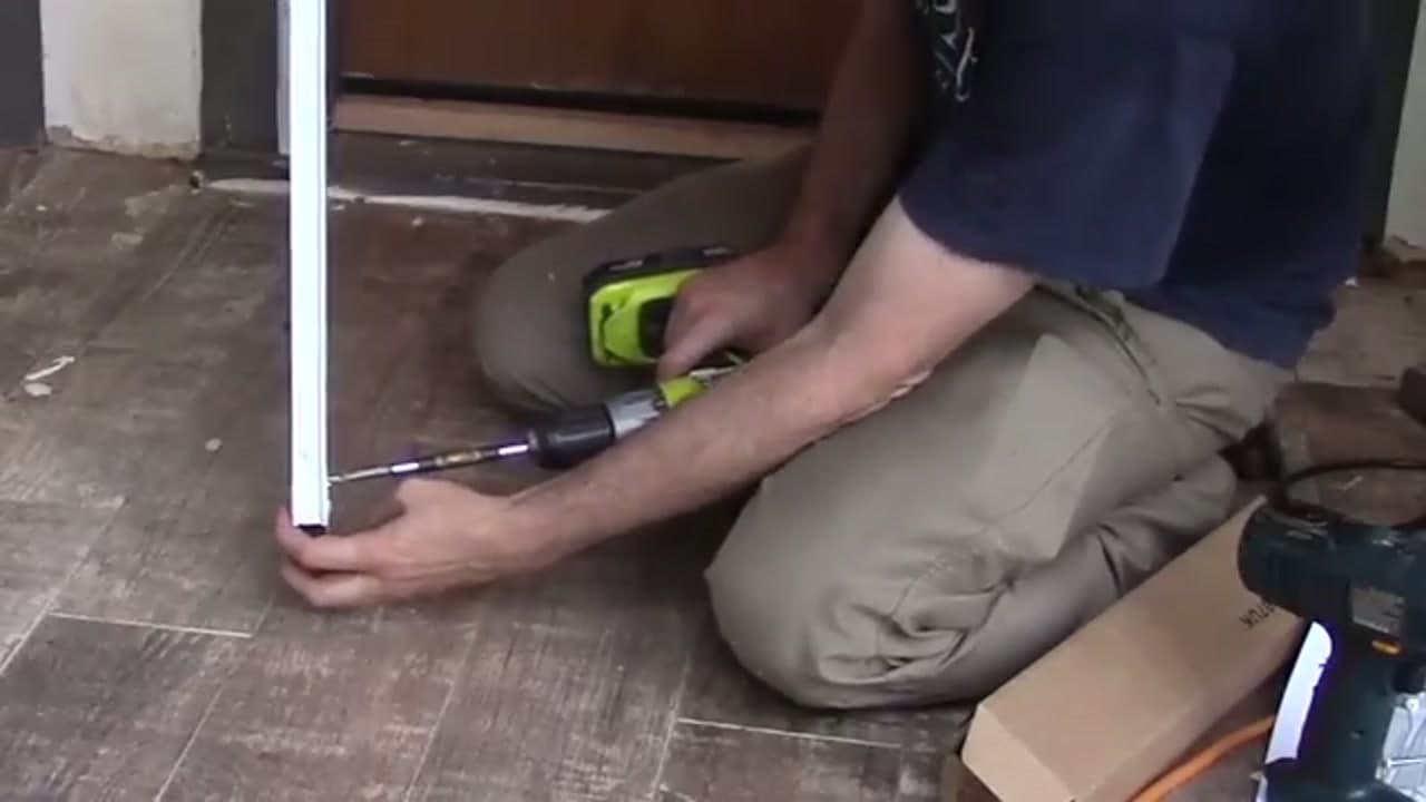 Step 4: Step 4: Set the Door and Screw the Bottom Rail