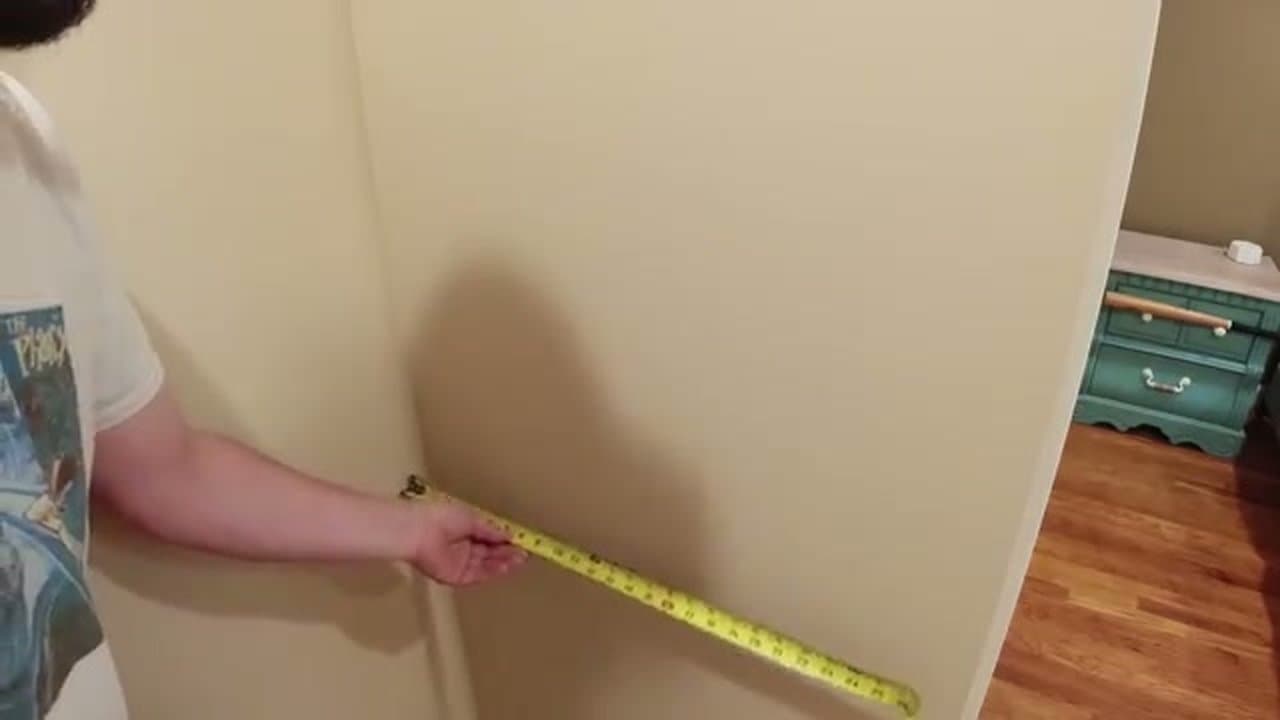 Step 1: Measure and Mark the Center of the Wall