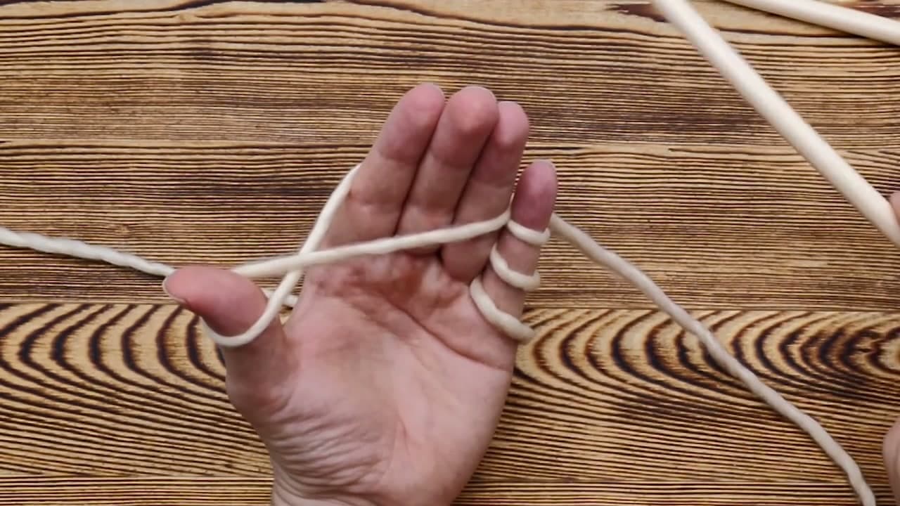 Step 2: Wrap the Yarn Around Your Hand for the Long Tail Cast On - How to Knit a Scarf for Beginners