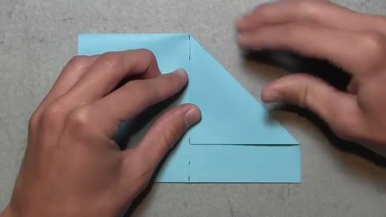 Step 2: Fold the Top Corners In