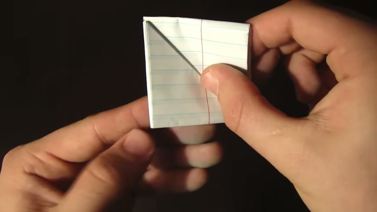 Step 7: Fold the Last Square Into the Football - How to Make a Paper Football (Classic Triangle Fold)