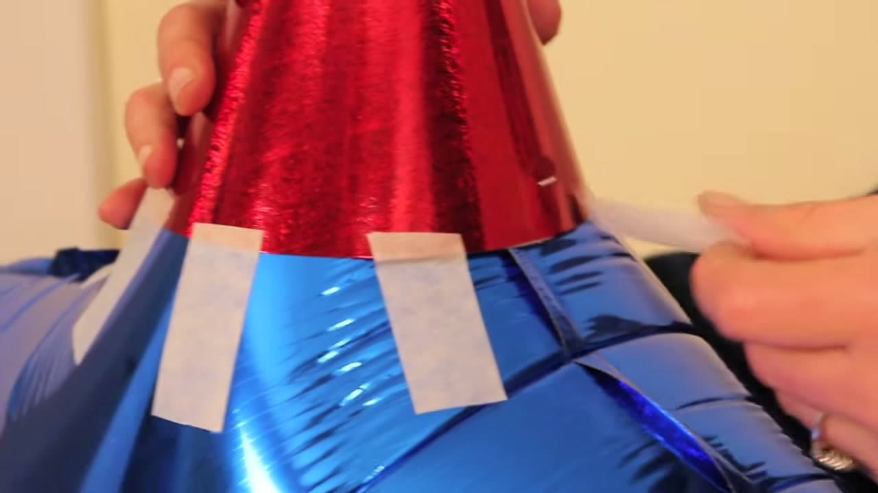 Step 2: Tape the Cones On - How to Make a Pinata