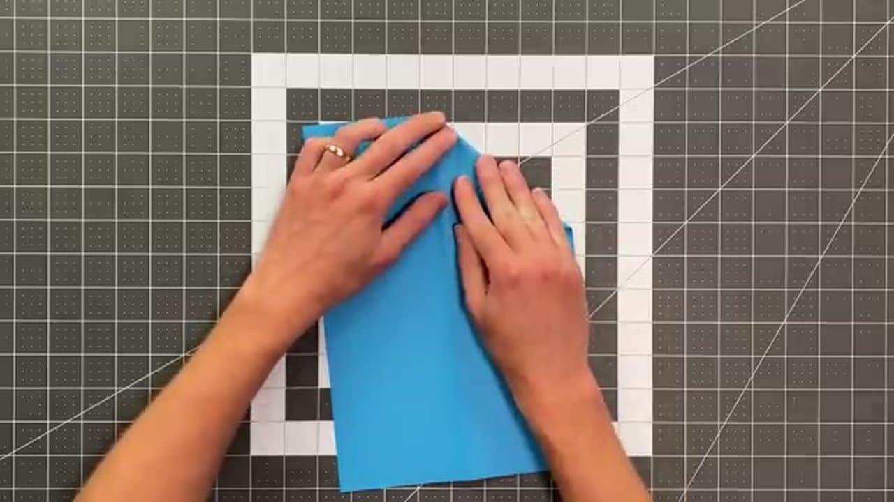 Step 2: Fold the Long Sides Toward the Center