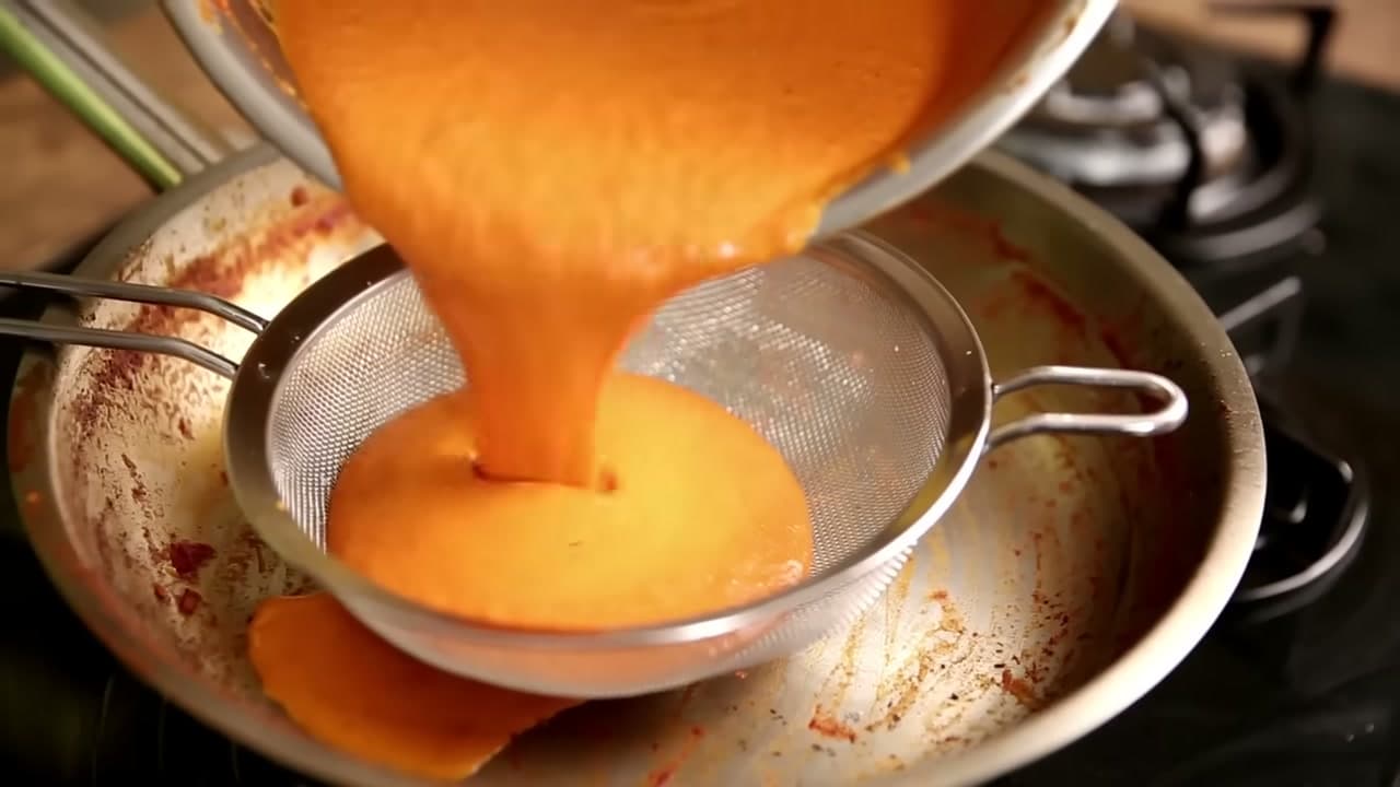 Step 7: Strain the Gravy - How to Make Butter Chicken (Restaurant Style at Home)