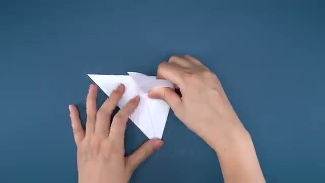 Step 3: Fold the Triangle in Half Again