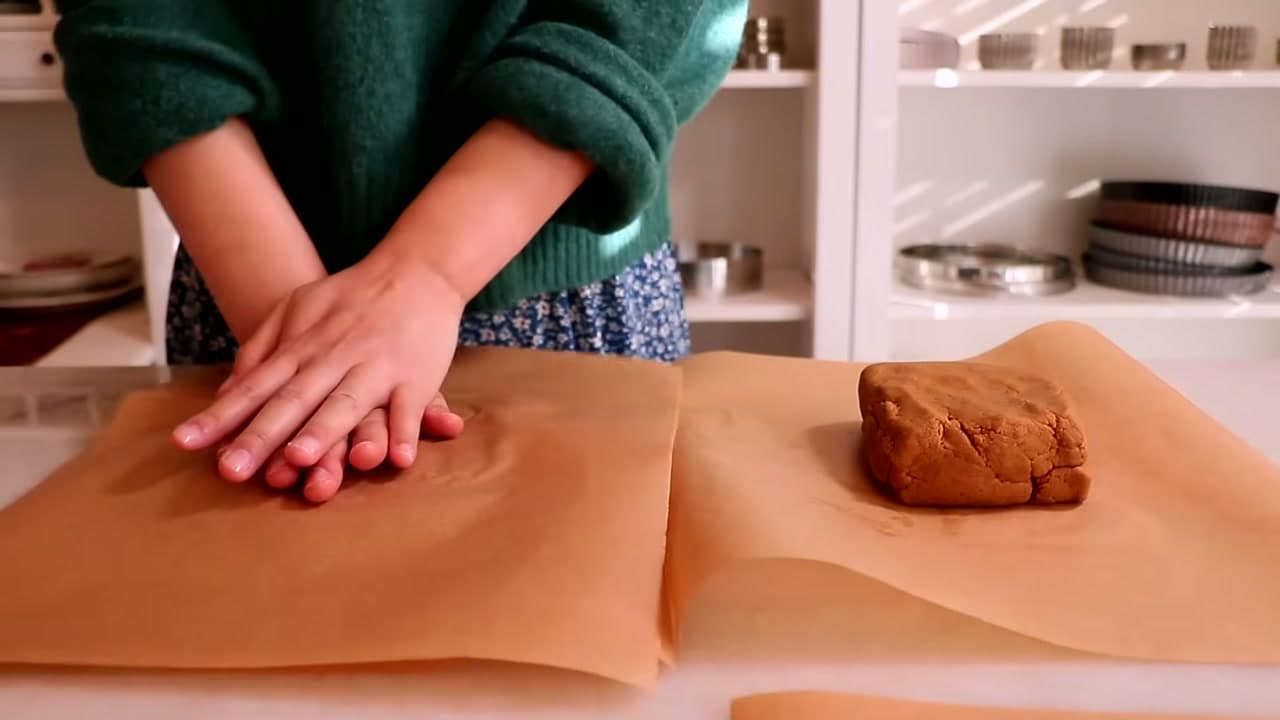 Step 6: Roll Between Parchment - Gingerbread Cookies