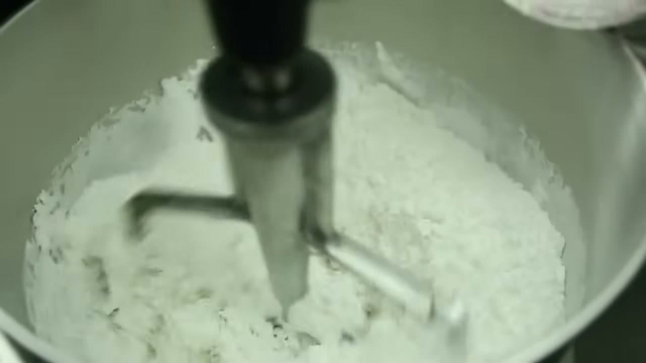 Step 3: Add Half the Water and the Flavourings - How to Make Royal Icing