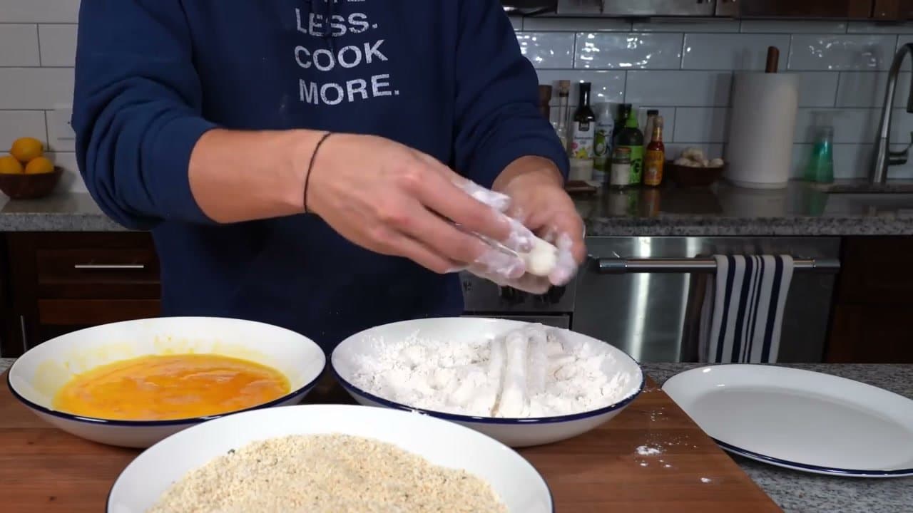 Step 2: Step 2: Coat each stick in flour and pat off the excess