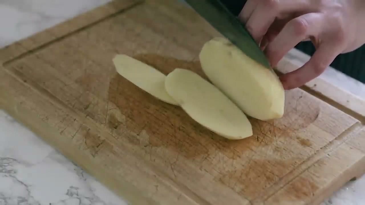 Step 4: Step 4: Cut the Potatoes Into Even Half-Inch Batons