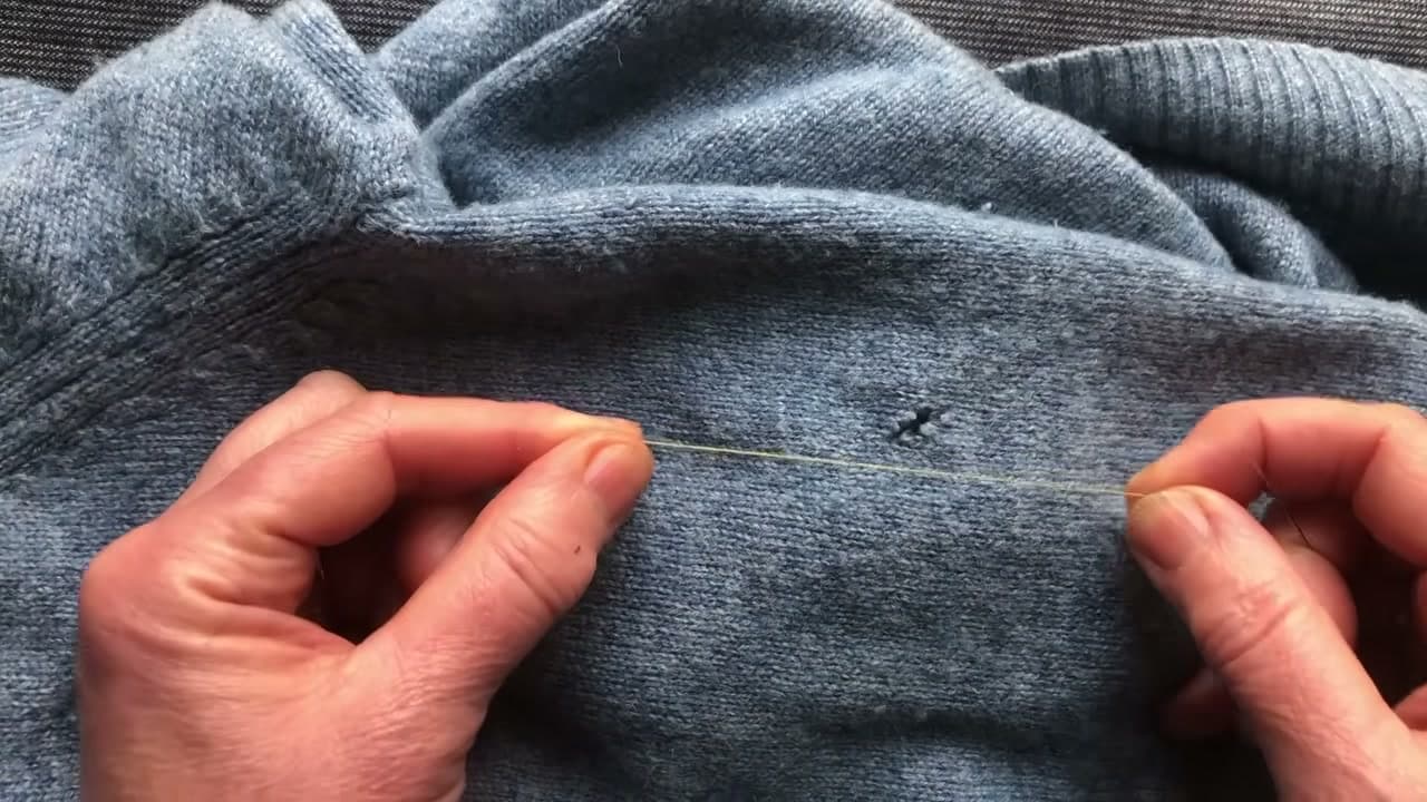 Step 2: Cut a Length of Thread to Match the Sweater - How to Fix a Hole in a Sweater